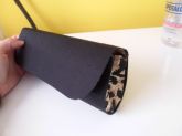 Clutch Preta com Oncinha