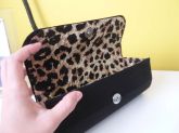 Clutch Preta com Oncinha